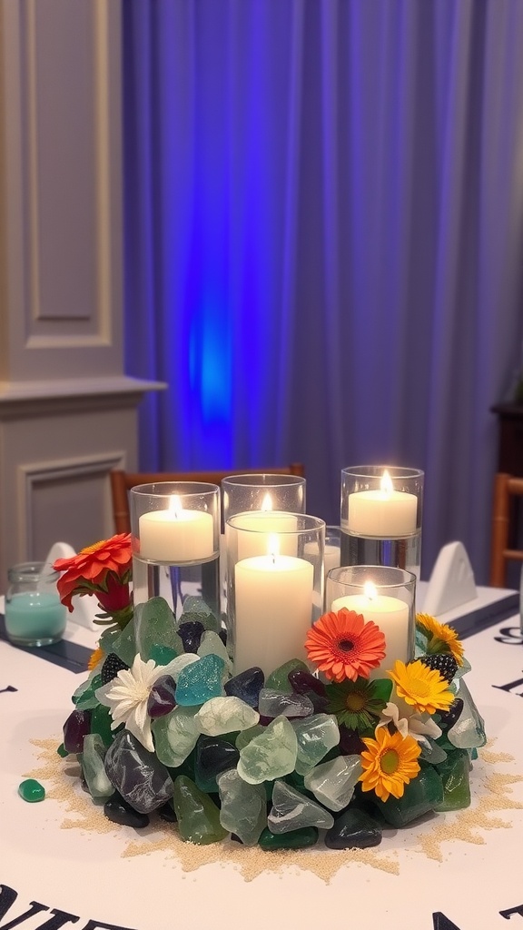 A decorative table centerpiece featuring sea glass, candles, and flowers.